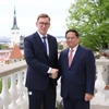Thủ tướng Phạm Minh Chính đón và hội đàm với Thủ tướng Cộng hòa Estonia Kristen Michal. (Ảnh: Dương Giang/TTXVN)