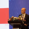 Ông Denzel Eades, Chủ tịch Hiệp hội Doanh nghiệp Anh Quốc tại Việt Nam, phát biểu khai mạc Hội nghị. (Ảnh: Hứa Chung/TTXVN)