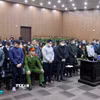 Các bị cáo tại phiên tòa xét xử. (Ảnh: Phạm Kiên/TTXVN)