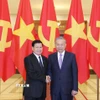 Tổng Bí thư Tô Lâm và Tổng Bí thư, Chủ tịch nước Lào Thongloun Sisoulith. (Ảnh: Thống Nhất/TTXVN)