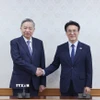 Tổng Bí thư Tô Lâm hội kiến Thủ tướng Hàn Quốc Kim Min Seok. (Ảnh: Thống Nhất/TTXVN)