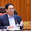 Thủ tướng Phạm Minh Chính chủ trì cuộc họp về tình hình triển khai tuyến đường sắt trọng điểm. (Ảnh: Dương Giang/TTXVN)
