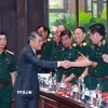 Thủ tướng Lê Minh Hưng với các đại biểu. (Ảnh: Trọng Đức/TTXVN)