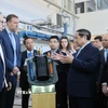 Thủ tướng Phạm Minh Chính thăm Phòng thí nghiệm hạt nhân của Viện Công nghệ Hoàng gia Thụy Điển. (Ảnh: Dương Giang/TTXVN)