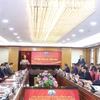 Tổng Bí thư Tô Lâm trao huy hiệu 45 năm tuổi Đảng tặng ông Phan Đình Trạc, Trưởng Ban Nội chính Trung ương. (Ảnh: Thống Nhất/TTXVN)