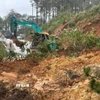 Sạt lở đã chia cắt hoàn toàn tuyến Quốc lộ 24. (Ảnh: Dư Toán/TTXVN)