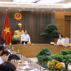 Phó Thủ tướng Lê Tiến Châu chủ trì họp với các bộ, ngành về tình hình triển khai xây dựng các trường phổ thông liên cấp tại các xã biên giới. (Ảnh: Lâm Khánh/TTXVN)