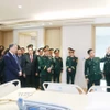 Tổng Bí thư Tô Lâm, Chủ tịch Quốc hội Trần Thanh Mẫn và các đại biểu thăm Viện Bảo vệ, chăm sóc sức khỏe Cán bộ Trung ương (A11) và Viện Lâm sàng các bệnh truyền nhiễm (A4). (Ảnh: Thống Nhất/TTXVN)