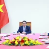 Thủ tướng Phạm Minh Chính điện đàm với Thủ tướng Australia Anthony Albanese. (Ảnh: Dương Giang/TTXVN)