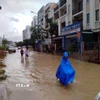 Mưa lớn gây ngập tuyến đường phường Bãi Cháy, tỉnh Quảng Ninh. (Ảnh: Hùng Hiếu/TTXVN phát)