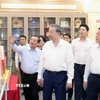 Tổng Bí thư Tô Lâm thăm Phòng truyền thống của Ban Tuyên giáo và Dân vận Trung ương (Hà Nội, 11/6/2025). (Ảnh: Thống Nhất/TTXVN)