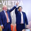 Thủ tướng Phạm Minh Chính và Tổng thống Brazil Luiz Inácio Lula da Silva tham dự Diễn đàn kinh tế Việt Nam-Brazil. (Ảnh: Dương Giang/TTXVN)