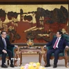 Thủ tướng Phạm Minh Chính tiếp ông Phoxay Sayasone, Bộ trưởng Bộ Lao động và Phúc lợi xã hội Lào. (Ảnh: Dương Giang/TTXVN)