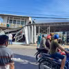 Vụ sạt lở bờ sông Cái Sắn làm ảnh hưởng 4 căn nhà, thiệt hại tài sản gần 2,5 tỷ đồng. (Ảnh: Thanh Liêm/TTXVN)