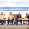 Các chuyên gia thảo luận giải pháp kết nối logistics Việt Nam với mạng lưới logistics toàn cầu. (Ảnh: Xuân Anh/TTXVN)