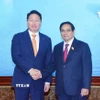 Thủ tướng Phạm Minh Chính tiếp ông Chey Tae-won, Chủ tịch Tập đoàn SK kiêm Chủ tịch Phòng Công nghiệp và Thương mại (KCCI), Hàn Quốc. (Ảnh: Dương Giang/TTXVN)