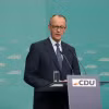 Lãnh đạo đảng Dân chủ/Xã hội Cơ đốc giáo (CDU/CSU) của Đức Friedrich Merz phát biểu trong cuộc họp báo tại Berlin ngày 24/2. (Ảnh: THX/TTXVN)