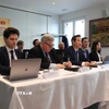 Các đại biểu tham dự hội thảo tại Phái đoàn thường trực Việt Nam tại Geneva. (Ảnh: Ngọc Ánh/TTXVN)