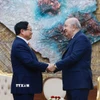 Thủ tướng Phạm Minh Chính hội kiến Tổng thống Algeria Abdelmadjid Tebboune. (Ảnh: Dương Giang/TTXVN)