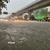 Một điểm ngập trên đường Nguyễn Trãi, Hà Nội. (Ảnh: Quốc Lũy/TTXVN)