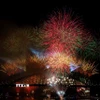 Pháo hoa rực rỡ chào đón năm mới 2026 tại Cầu Cảng Sydney, Australia. (Ảnh: THX/TTXVN)