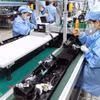 Dây chuyền lắp ráp sản phẩm tại một nhà máy trong Khu công nghiệp Đông Mai, tỉnh Quảng Ninh. (Ảnh: Vũ Sinh/TTXVN)