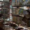 Phòng thư viện của một trường học ở Đắk Lắk bị ngập nước, sách vở hư hỏng hoàn toàn. (Ảnh: Nguyên Dung/TTXVN)