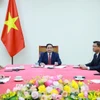 Thủ tướng Phạm Minh Chính điện đàm với Thủ tướng Singapore Lawrence Wong. (Ảnh: Dương Giang/TTXVN)
