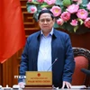 Thủ tướng Phạm Minh Chính chủ trì cuộc họp với lãnh đạo tỉnh Quảng Trị về xây dựng nhà ở cho các gia đình bị thiệt hại do thiên tai tại Quảng Trị. (Ảnh: Dương Giang/TTXVN)