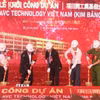 Các đại biểu thực hiện nghi thức khởi công dự án. (Ảnh: Thanh Tuấn/TTXVN)
