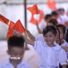 Niềm vui của học sinh lớp 1. (Ảnh minh họa. Nguồn: TTXVN)