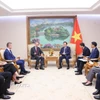 Phó Thủ tướng Trần Hồng Hà tiếp Đại sứ Cộng hòa Italy tại Việt Nam Marco Della Seta và Lãnh đạo Tập đoàn Fincantieri. (Ảnh: Văn Điệp/TTXVN)