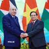 Thủ tướng Phạm Minh Chính hội kiến Chủ tịch Hạ viện Vương quốc Hashemite Jordan Mazen Turki El Qadi. (Ảnh: Dương Giang/TTXVN)