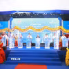 Các đại biểu bấm nút khởi công dự án Nhà ở xã hội Khu đô thị Cầu Trúc, phường Bách Quang. (Ảnh: Trần Trang/TTXVN)