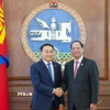 Phó Chủ tịch Quốc hội Trần Quang Phương và Chủ tịch Quốc hội Mông Cổ Dashzegve Amarbayasgalan. (Ảnh: TTXVN phát)