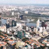 Trung tâm Thành phố Hồ Chí Minh và khu vực bán đảo Thủ Thiêm. (Ảnh: Hồng Đạt/TTXVN)