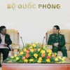Đại tướng, Bộ trưởng Quốc phòng Phan Văn Giang tiếp Quyền Tổng Thư ký Quốc phòng Nam Phi, bà Thobekile Gamede. (Ảnh: Trọng Đức/TTXVN)