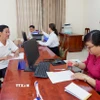 Người dân đến giải quyết thủ tục hành chính tại Trung tâm Phục vụ hành chính công xã Mỹ Yên, tỉnh Tây Ninh. (Ảnh: Đức Hạnh/TTXVN)