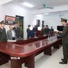 Cơ quan An ninh điều tra thi hành lệnh khám xét đối với Vũ Như Anh. (Ảnh: TTXVN phát)