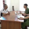 Đối tượng Vũ Anh Tuấn tại cơ quan công an. (Nguồn: Công an Nghệ An)