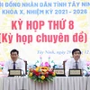 Lãnh đạo Hội đồng Nhân dân tỉnh Tây Ninh chủ trì Kỳ họp thứ 8. (Ảnh: Thanh Tân/TTXVN)