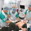 Diễn tập sơ cấp cứu nạn nhân tại Bệnh viện dã chiến cấp 2 số 2 tham gia lực lượng gìn giữ hòa bình của Liên hợp quốc. (Ảnh minh họa: Dương Giang/TTXVN)