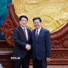 Chủ tịch nước Lương Cường hội đàm với Tổng Bí thư, Chủ tịch nước Lào Thongloun Sisoulith. (Ảnh: Lâm Khánh/TTXVN)