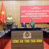 Quang cảnh lễ biểu dương, khen thưởng Ban chuyên án triệt phá đường dây đánh bạc và tổ chức đánh bạc. (Ảnh: Thế Duyệt/TTXVN)