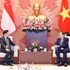 Chủ tịch Quốc hội Trần Thanh Mẫn hội kiến Thủ tướng Singapore Lawrence Wong. (Ảnh: Doãn Tấn/TTXVN)