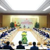 Hội nghị Thường trực Chính phủ gặp gỡ doanh nghiệp. (Ảnh: Dương Giang/TTXVN)