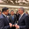 Quyền Bộ trưởng Bộ Công Thương Lê Mạnh Hùng trao đổi với ông David Fogel, Trợ lý Bộ trưởng Bộ Thương mại, Giám đốc Cơ quan Thương mại Quốc tế Hoa Kỳ. (Nguồn: Bộ Công Thương)