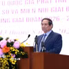 Thủ tướng Phạm Minh Chính phát biểu tại Hội nghị toàn quốc Tổng kết Chương trình mục tiêu quốc gia phát triển kinh tế-xã hội vùng đồng bào dân tộc thiểu số. (Ảnh: Dương Giang/TTXVN)