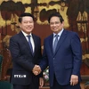 Thủ tướng Phạm Minh Chính tiếp ông Saleumxay Kommasith, Phó Thủ tướng, Trưởng Ban Cải cách Doanh nghiệp Lào. (Ảnh: Dương Giang/TTXVN)