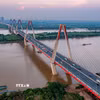Nghị quyết về Kế hoạch phát triển kinh tế-xã hội 5 năm 2026-2030. Trong ảnh: Cầu Nhật Tân, cây cầu thép dây văng lớn nhất Việt Nam và là biểu tượng độc đáo của thủ đô Hà Nội. Cây cầu này đóng góp một phần quan trọng trong nền kinh tế cũng như giao thông vận tải của thủ đô, rút ngắn quãng đường di chuyển từ trung tâm thành phố đến Sân bay Quốc tế Nội Bài. (Ảnh: Phạm Tuấn Anh/TTXVN)